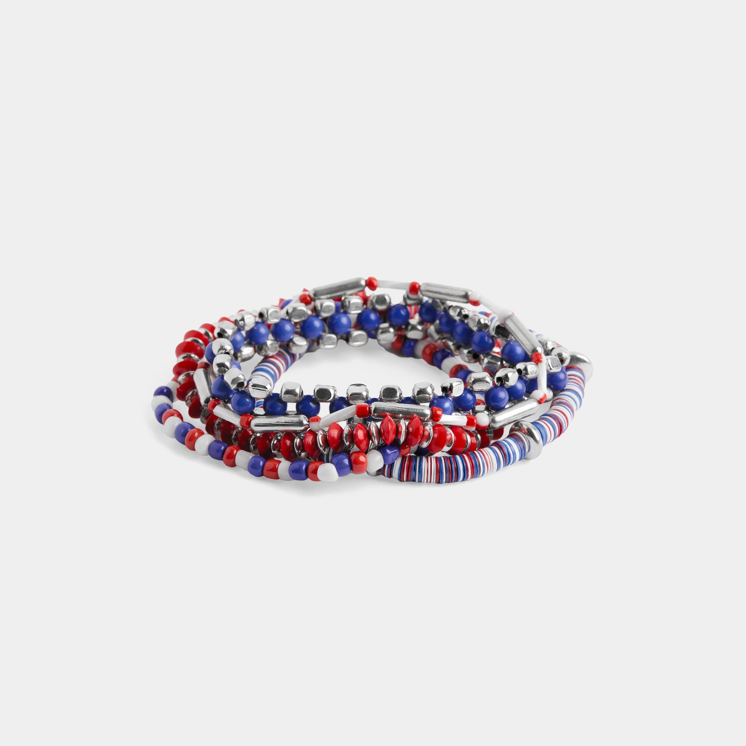 Set of red, white, and blue beaded bracelets on a white background