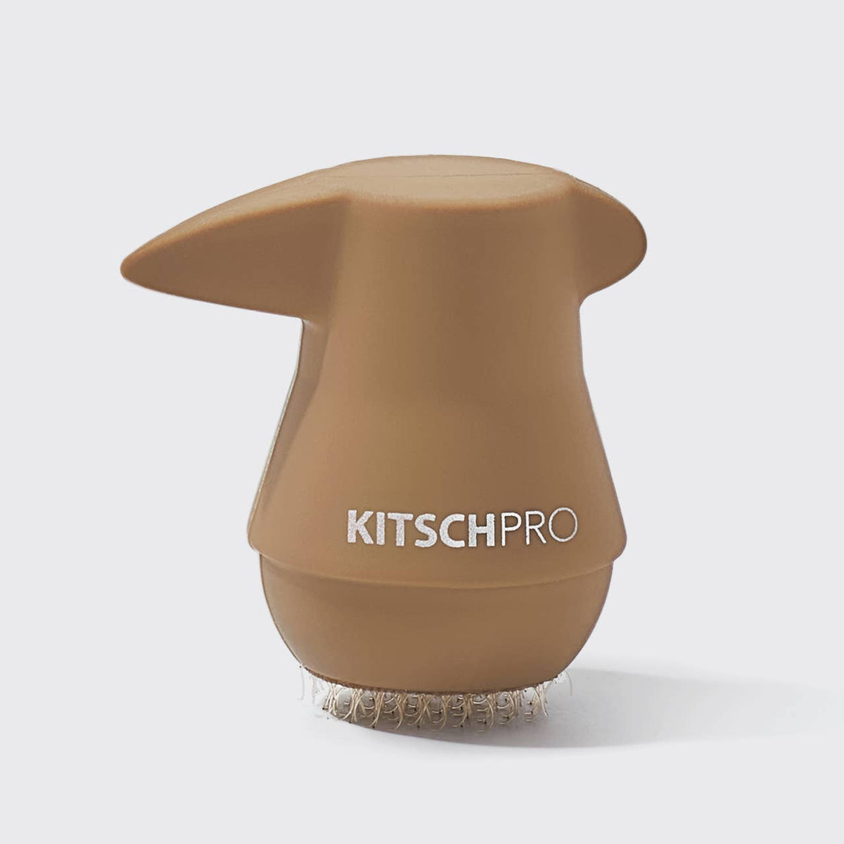 Close-up of the blonde KITSCH PONYFULL ponytail volumizer with its pick and gripping base