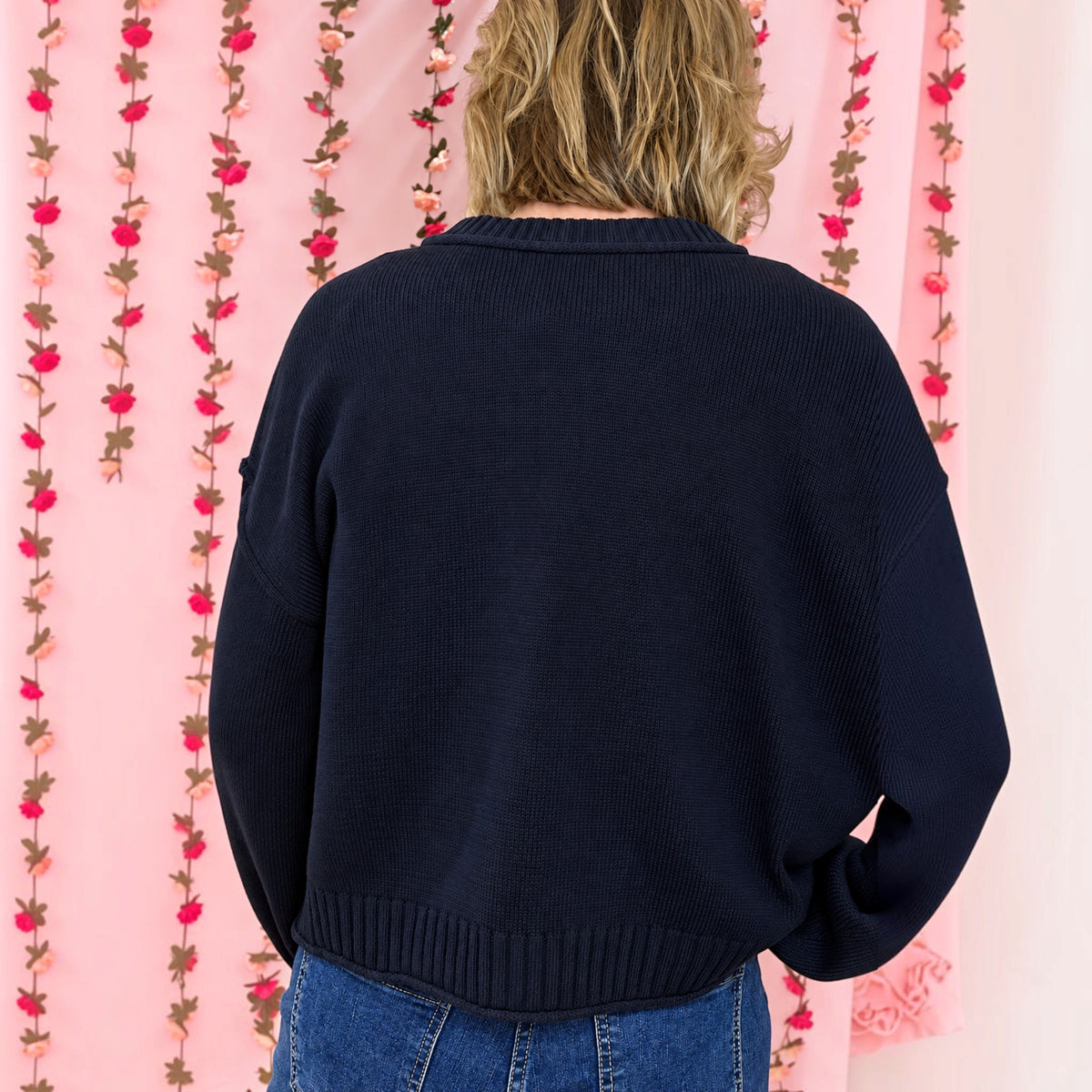 Back view of the navy Vintage Soul raw edge cardigan with a relaxed boxy fit