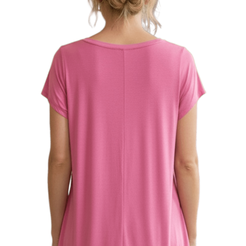 Pink t-shirt worn by a person on a white background