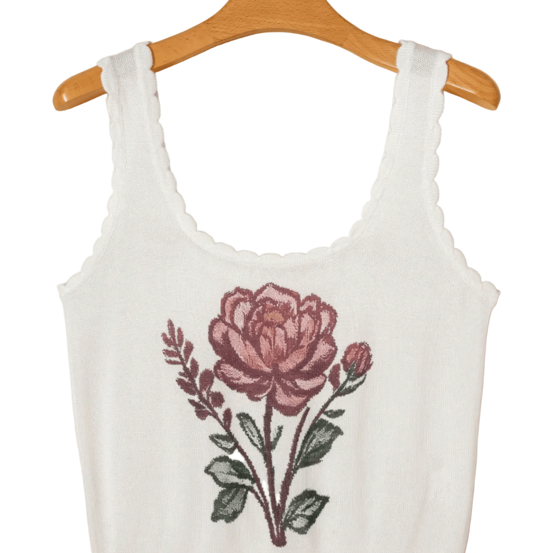 White tank top with a floral design on a beige background