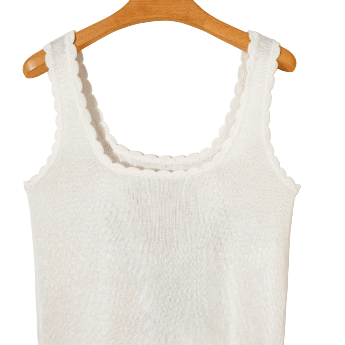 White tank top on a wooden hanger against a beige background