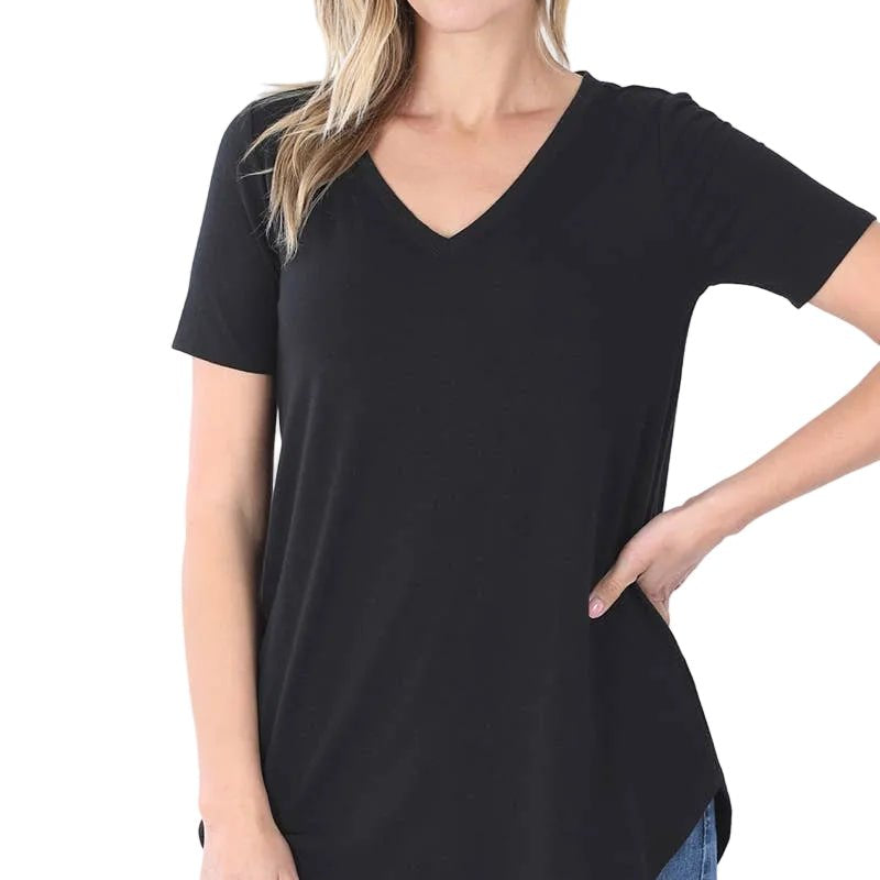 Woman wearing a black t-shirt and blue jeans on a white background
