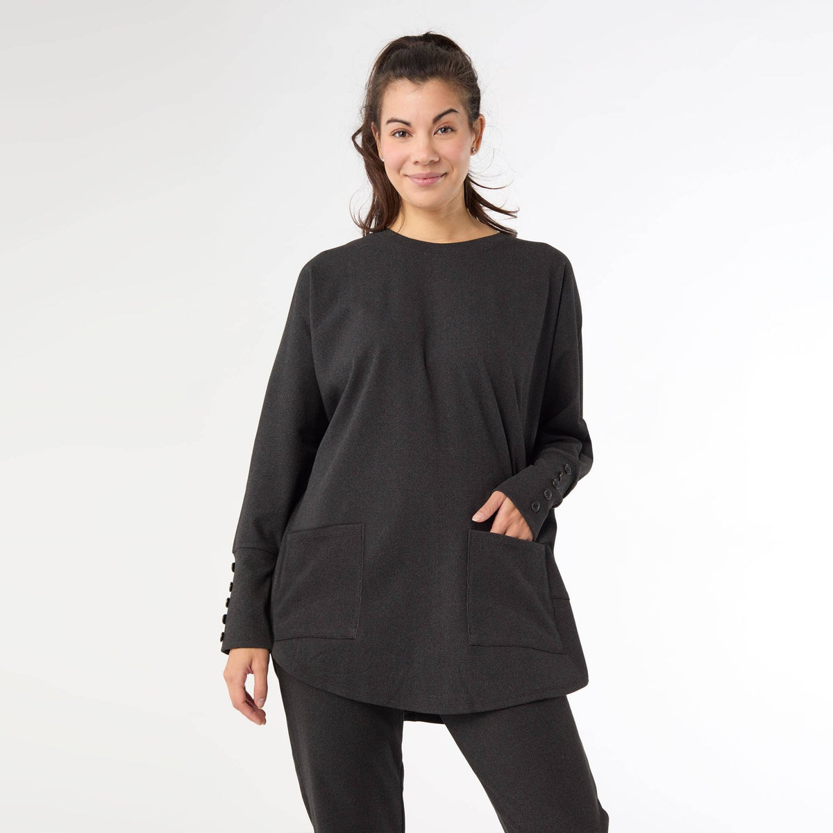 Front view of the midnight black brushed knit button back sweater