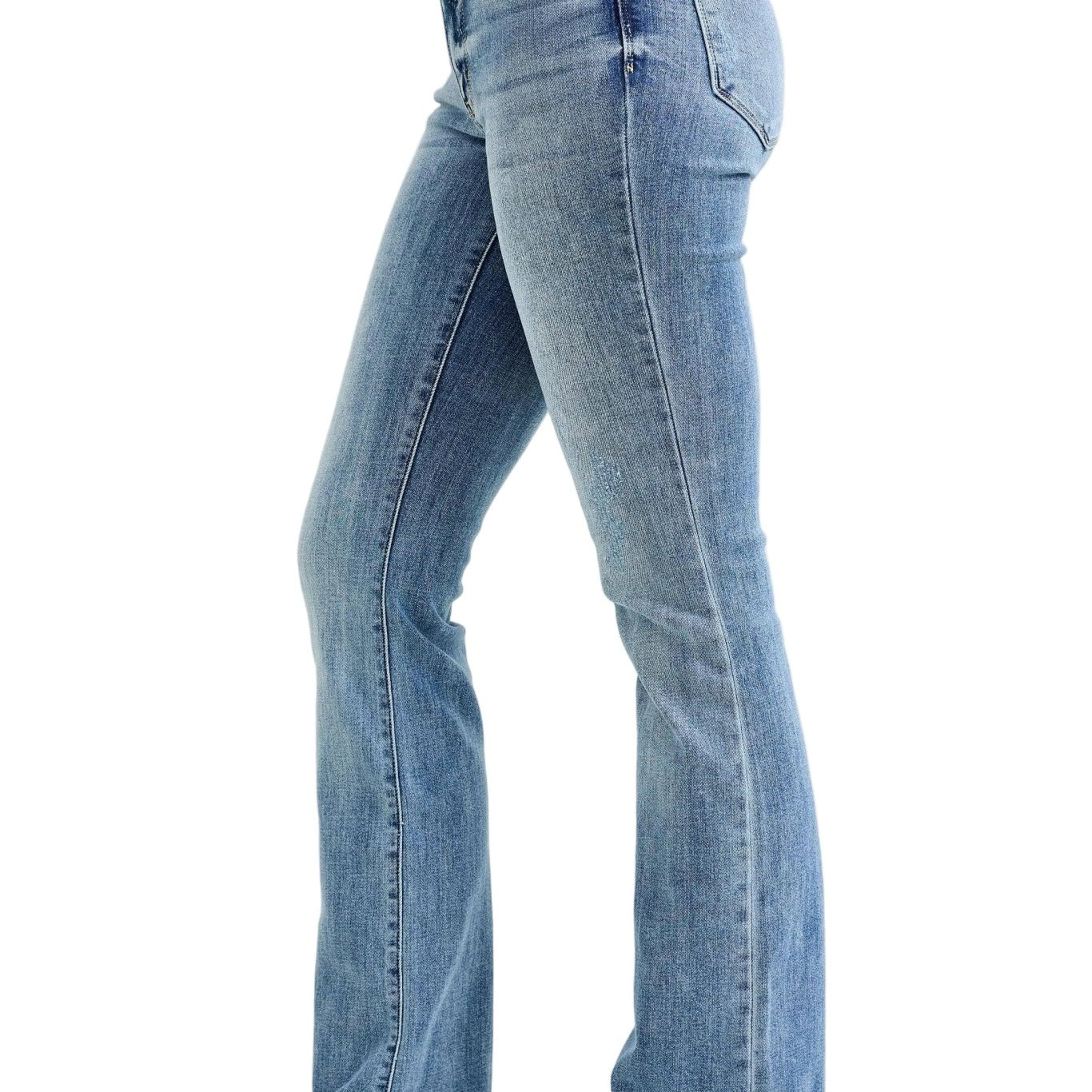 Light blue jeans worn by a person on a white background