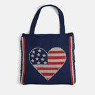 Navy blue knit bag with an American flag heart design on a white background