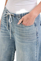 Close-up of waistband and drawcord detail on Judy Blue High Waist Palazzo Featherweight Drawcord Jeans, white background