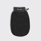 Black exfoliating shower mitt with KITSCH logo and hanging loop on white