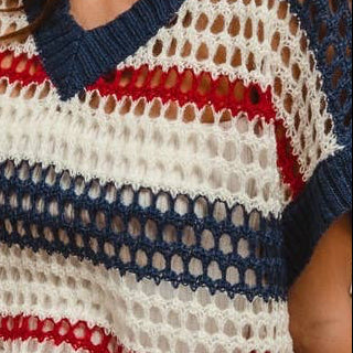 Up close picture of a Woman wearing a striped crochet top
