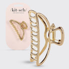 KITSCH open shape claw clip in gold shown with its packaging