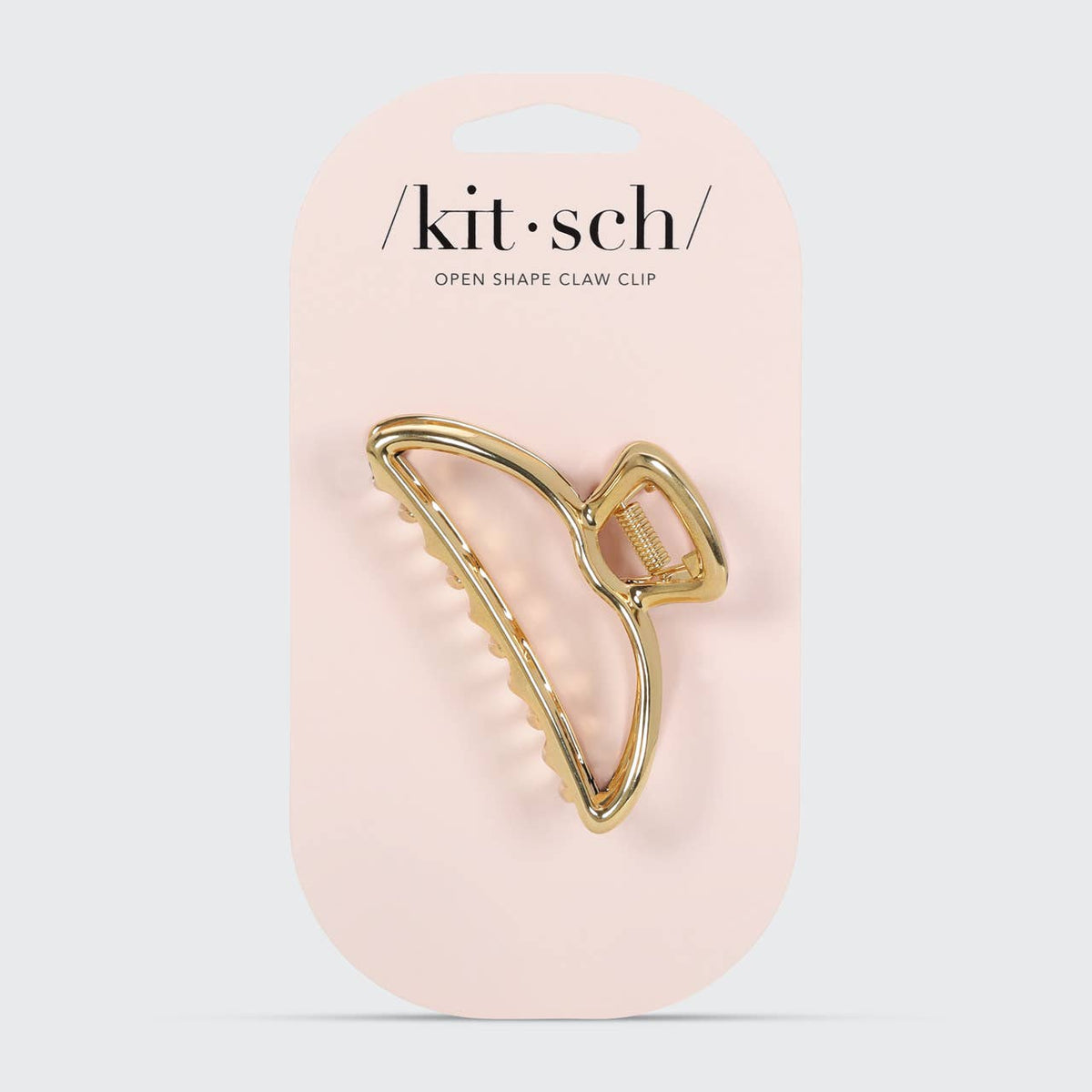 KITSCH gold open shape hair claw clip on its blush retail card