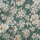 Floral pattern with white flowers on a teal background