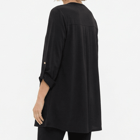 Woman wearing a black cardigan on a white background