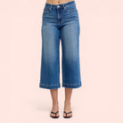 Blue jeans on a plain background