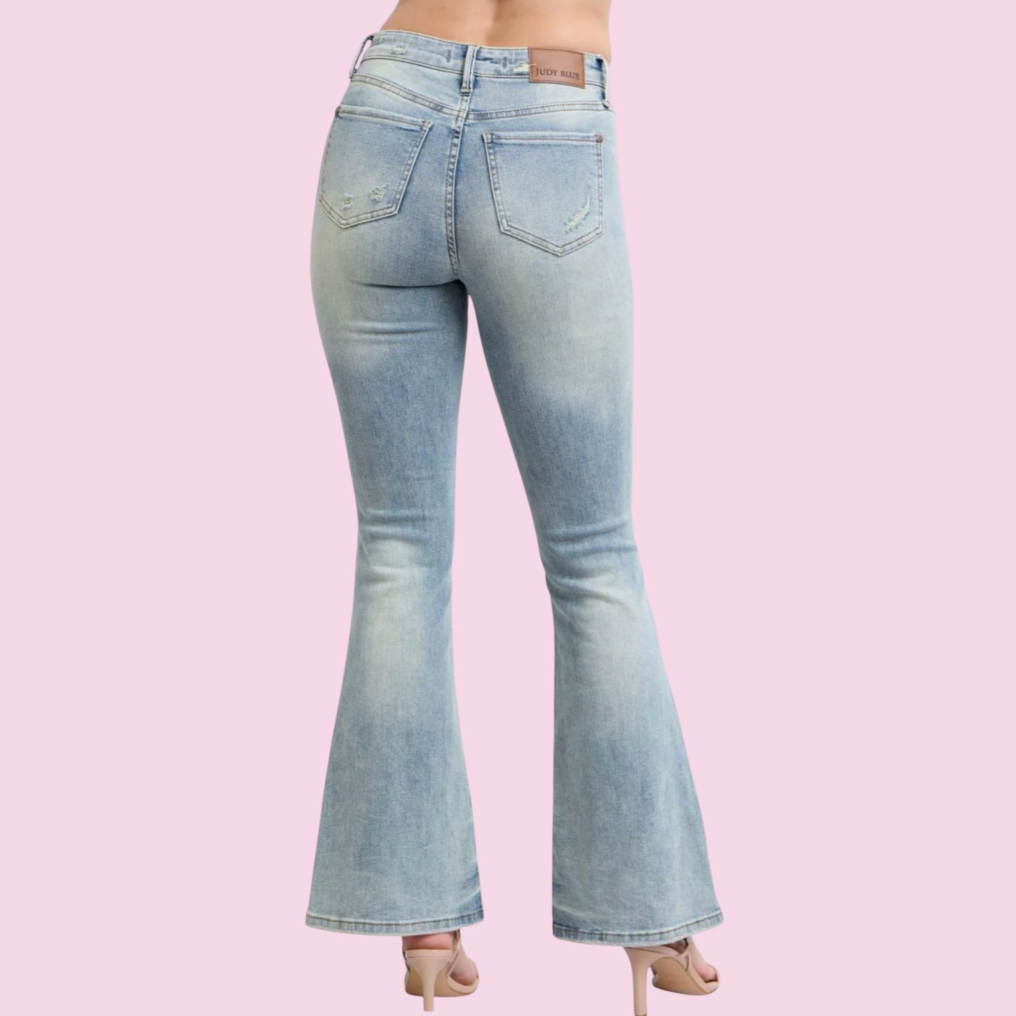 Judy Blue mid rise flare jeans slim thigh soft flare silhouette back view