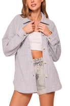 Heather gray waffle knit button down shacket worn open with a white crop top and denim shorts, showing the relaxed fit