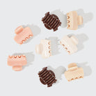 Kitsch Rosewood mini claw clips laid out in champagne, blush, terracotta and brown