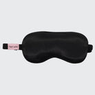 Black satin weighted sleep mask with adjustable strap and KITSCH tag