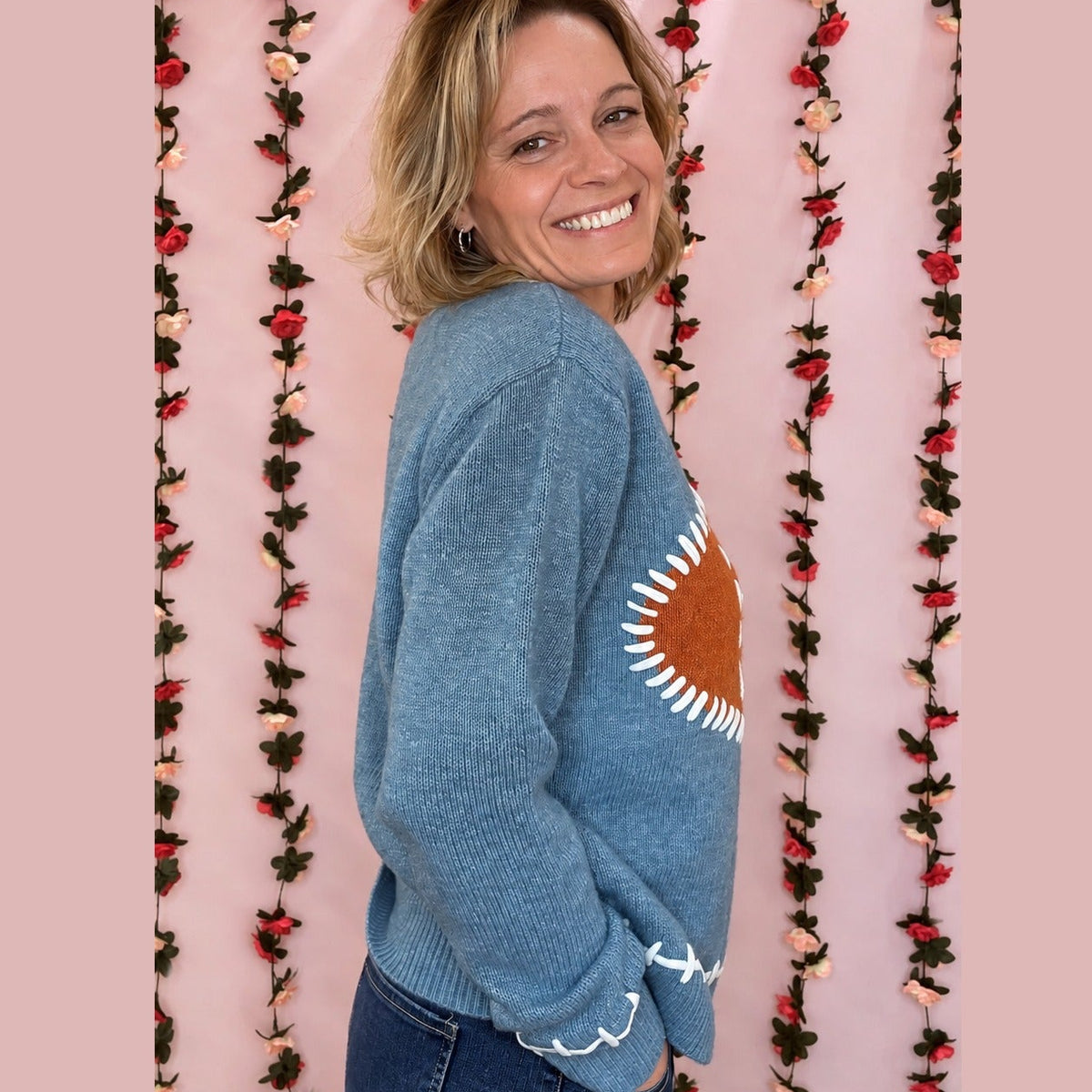 Dusty blue football sweater – side view